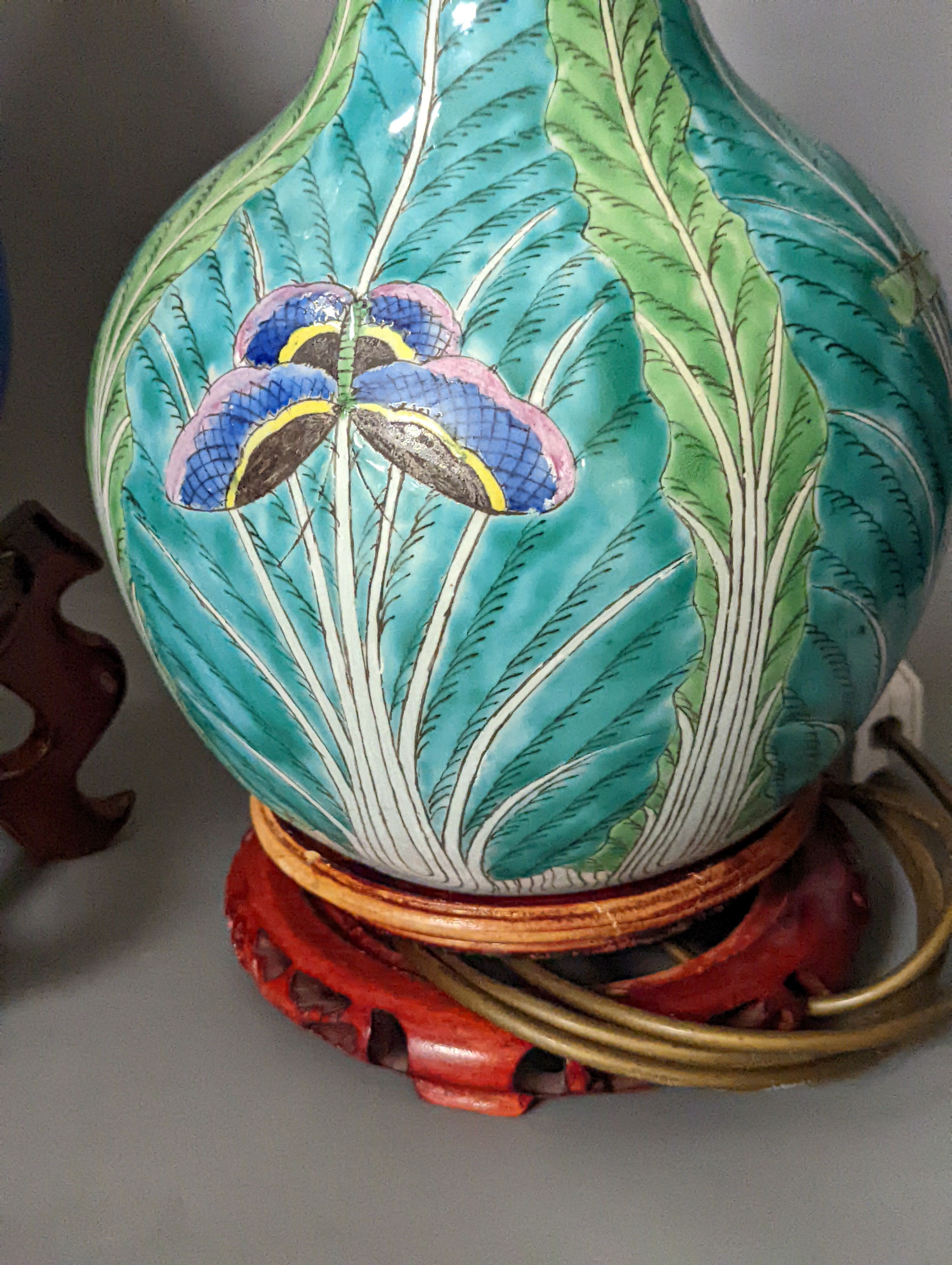 A Japanese gilt lacquered and turquoise glazed ’dragon’ vase on stand, and a Chinese cabbage patterned table lamp, Dragon vase and stand 65 cms high.